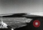 Standbild USS Burton Island am St Lawrence Island Saint Lawrence Island Alaska USA, 1952, aus Sekunde 5 historischem Filmmaterial Videoclip 65675077435