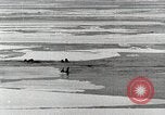 Standbild USS Burton Island am St Lawrence Island Saint Lawrence Island Alaska USA, 1952, aus Sekunde 30 historischem Filmmaterial Videoclip 65675077435