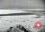 Standbild USS Burton Island am St Lawrence Island Saint Lawrence Island Alaska USA, 1952, aus Sekunde 31 historischem Filmmaterial Videoclip 65675077435