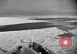 Standbild USS Burton Island am St Lawrence Island Saint Lawrence Island Alaska USA, 1952, aus Sekunde 39 historischem Filmmaterial Videoclip 65675077435