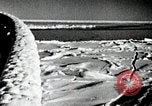 Standbild USS Burton Island am St Lawrence Island Saint Lawrence Island Alaska USA, 1952, aus Sekunde 44 historischem Filmmaterial Videoclip 65675077435
