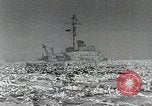 Image of USS Burton Island breaking way through ice in Bering Sea Bering Sea, 1952, second 1 stock footage video 65675077436