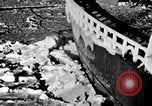 Image of USS Burton Island breaking way through ice in Bering Sea Bering Sea, 1952, second 7 stock footage video 65675077436