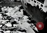 Image of USS Burton Island breaking way through ice in Bering Sea Bering Sea, 1952, second 11 stock footage video 65675077436