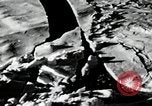 Image of USS Burton Island breaking way through ice in Bering Sea Bering Sea, 1952, second 22 stock footage video 65675077436