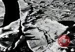 Image of USS Burton Island breaking way through ice in Bering Sea Bering Sea, 1952, second 23 stock footage video 65675077436