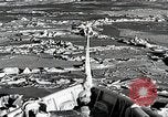 Image of USS Burton Island breaking way through ice in Bering Sea Bering Sea, 1952, second 24 stock footage video 65675077436