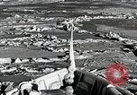 Image of USS Burton Island breaking way through ice in Bering Sea Bering Sea, 1952, second 25 stock footage video 65675077436