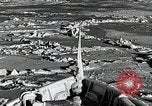 Image of USS Burton Island breaking way through ice in Bering Sea Bering Sea, 1952, second 26 stock footage video 65675077436