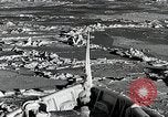 Image of USS Burton Island breaking way through ice in Bering Sea Bering Sea, 1952, second 29 stock footage video 65675077436
