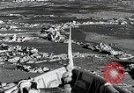Image of USS Burton Island breaking way through ice in Bering Sea Bering Sea, 1952, second 32 stock footage video 65675077436