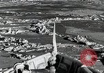 Image of USS Burton Island breaking way through ice in Bering Sea Bering Sea, 1952, second 33 stock footage video 65675077436