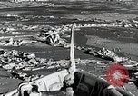 Image of USS Burton Island breaking way through ice in Bering Sea Bering Sea, 1952, second 34 stock footage video 65675077436