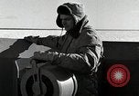Image of USS Burton Island breaking way through ice in Bering Sea Bering Sea, 1952, second 40 stock footage video 65675077436