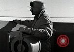 Image of USS Burton Island breaking way through ice in Bering Sea Bering Sea, 1952, second 41 stock footage video 65675077436