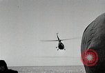 Image of USS Burton Island breaking way through ice in Bering Sea Bering Sea, 1952, second 61 stock footage video 65675077436