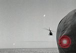 Image of USS Burton Island breaking way through ice in Bering Sea Bering Sea, 1952, second 62 stock footage video 65675077436