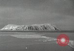 Image of USS Burton Island arriving at King Island King Island Alaska USA, 1952, second 1 stock footage video 65675077437