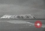 Image of USS Burton Island arriving at King Island King Island Alaska USA, 1952, second 3 stock footage video 65675077437