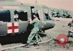 Image of helicopter medical evacuations Vietnam, 1966, second 51 stock footage video 65675077438