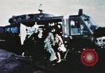 Image of wounded children airlifted via helicopter Vietnam, 1966, second 1 stock footage video 65675077439