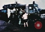 Image of wounded children airlifted via helicopter Vietnam, 1966, second 3 stock footage video 65675077439
