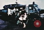 Image of wounded children airlifted via helicopter Vietnam, 1966, second 4 stock footage video 65675077439