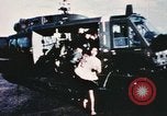 Image of wounded children airlifted via helicopter Vietnam, 1966, second 5 stock footage video 65675077439