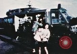 Image of wounded children airlifted via helicopter Vietnam, 1966, second 6 stock footage video 65675077439