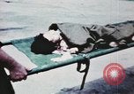 Image of wounded children airlifted via helicopter Vietnam, 1966, second 17 stock footage video 65675077439
