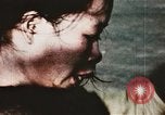 Image of wounded children airlifted via helicopter Vietnam, 1966, second 32 stock footage video 65675077439