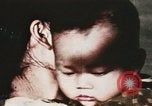Image of wounded children airlifted via helicopter Vietnam, 1966, second 40 stock footage video 65675077439