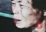 Image of wounded children airlifted via helicopter Vietnam, 1966, second 52 stock footage video 65675077439