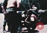 Image of medical aid via Huey helicopter and ambulance Vietnam, 1966, second 3 stock footage video 65675077440
