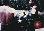 Image of medical aid via Huey helicopter and ambulance Vietnam, 1966, second 6 stock footage video 65675077440