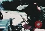 Image of medical aid via Huey helicopter and ambulance Vietnam, 1966, second 8 stock footage video 65675077440