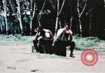 Image of medical aid via Huey helicopter and ambulance Vietnam, 1966, second 19 stock footage video 65675077440
