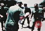 Image of medical aid via Huey helicopter and ambulance Vietnam, 1966, second 24 stock footage video 65675077440