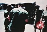 Image of medical aid via Huey helicopter and ambulance Vietnam, 1966, second 25 stock footage video 65675077440