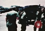 Image of medical aid via Huey helicopter and ambulance Vietnam, 1966, second 27 stock footage video 65675077440
