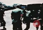 Image of medical aid via Huey helicopter and ambulance Vietnam, 1966, second 28 stock footage video 65675077440