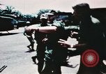 Image of medical aid via Huey helicopter and ambulance Vietnam, 1966, second 29 stock footage video 65675077440