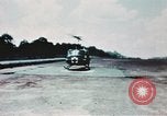 Image of medical aid via Huey helicopter and ambulance Vietnam, 1966, second 31 stock footage video 65675077440