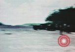 Image of medical aid via Huey helicopter and ambulance Vietnam, 1966, second 33 stock footage video 65675077440