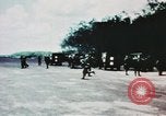 Image of medical aid via Huey helicopter and ambulance Vietnam, 1966, second 35 stock footage video 65675077440