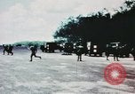 Image of medical aid via Huey helicopter and ambulance Vietnam, 1966, second 36 stock footage video 65675077440