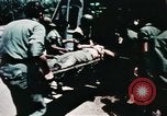 Image of medical aid via Huey helicopter and ambulance Vietnam, 1966, second 43 stock footage video 65675077440