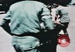Image of medical aid via Huey helicopter and ambulance Vietnam, 1966, second 47 stock footage video 65675077440