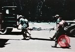 Image of medical aid via Huey helicopter and ambulance Vietnam, 1966, second 52 stock footage video 65675077440
