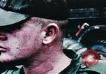 Image of medical aid via Huey helicopter and ambulance Vietnam, 1966, second 53 stock footage video 65675077440